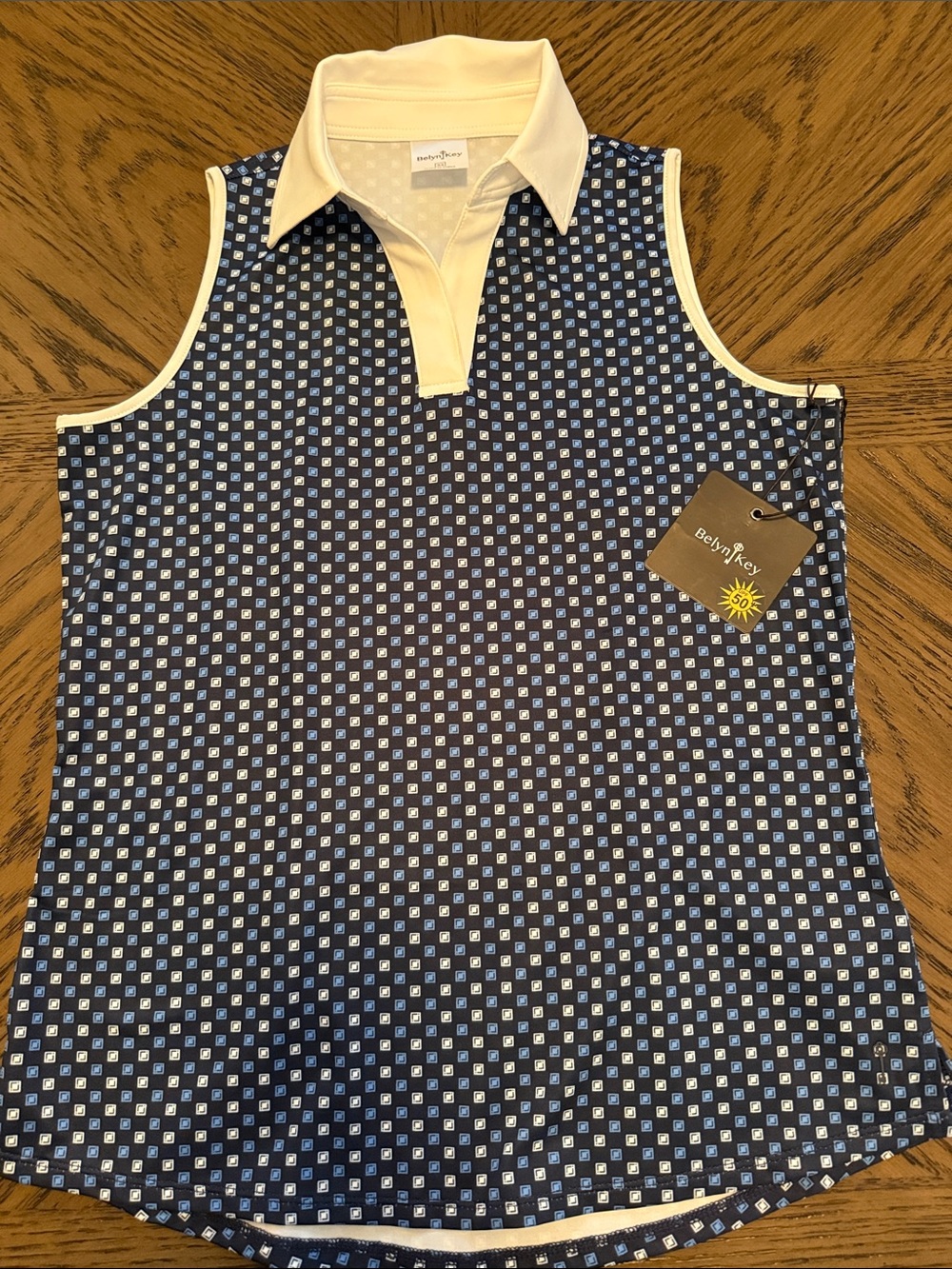 Belyn Key Womans Navy and Cream Patterned Sleeveless Polo